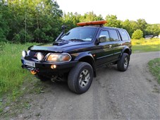 Přední pevnostní nárazník Mitsubishi Pajero SPORT (04-08) bez bullbaru